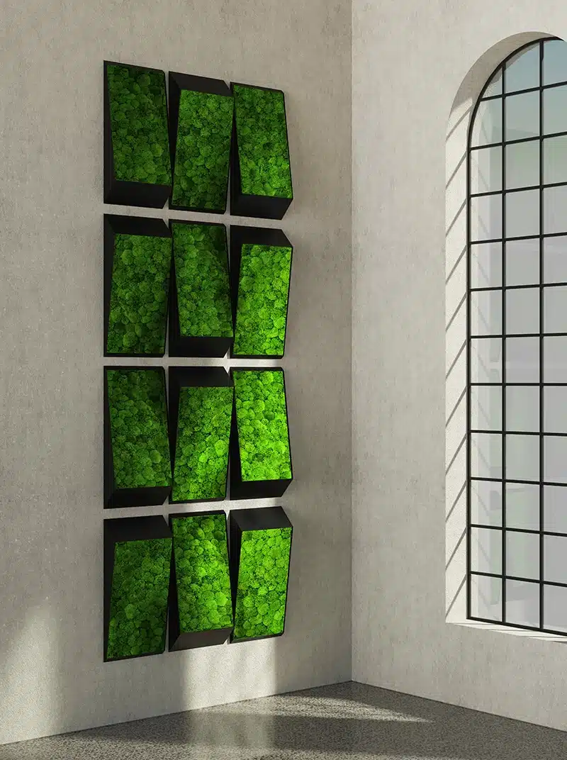 Vertical wall art with artificial green plants.
